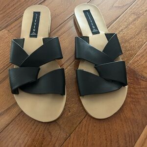 Gently worn, black casual summer sandals